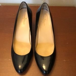 Cole Haan black patent pumps